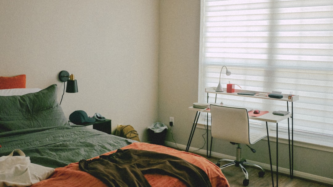 a-bedroom-with-a-bed-desk-and-chair-jm-dzdftnbk